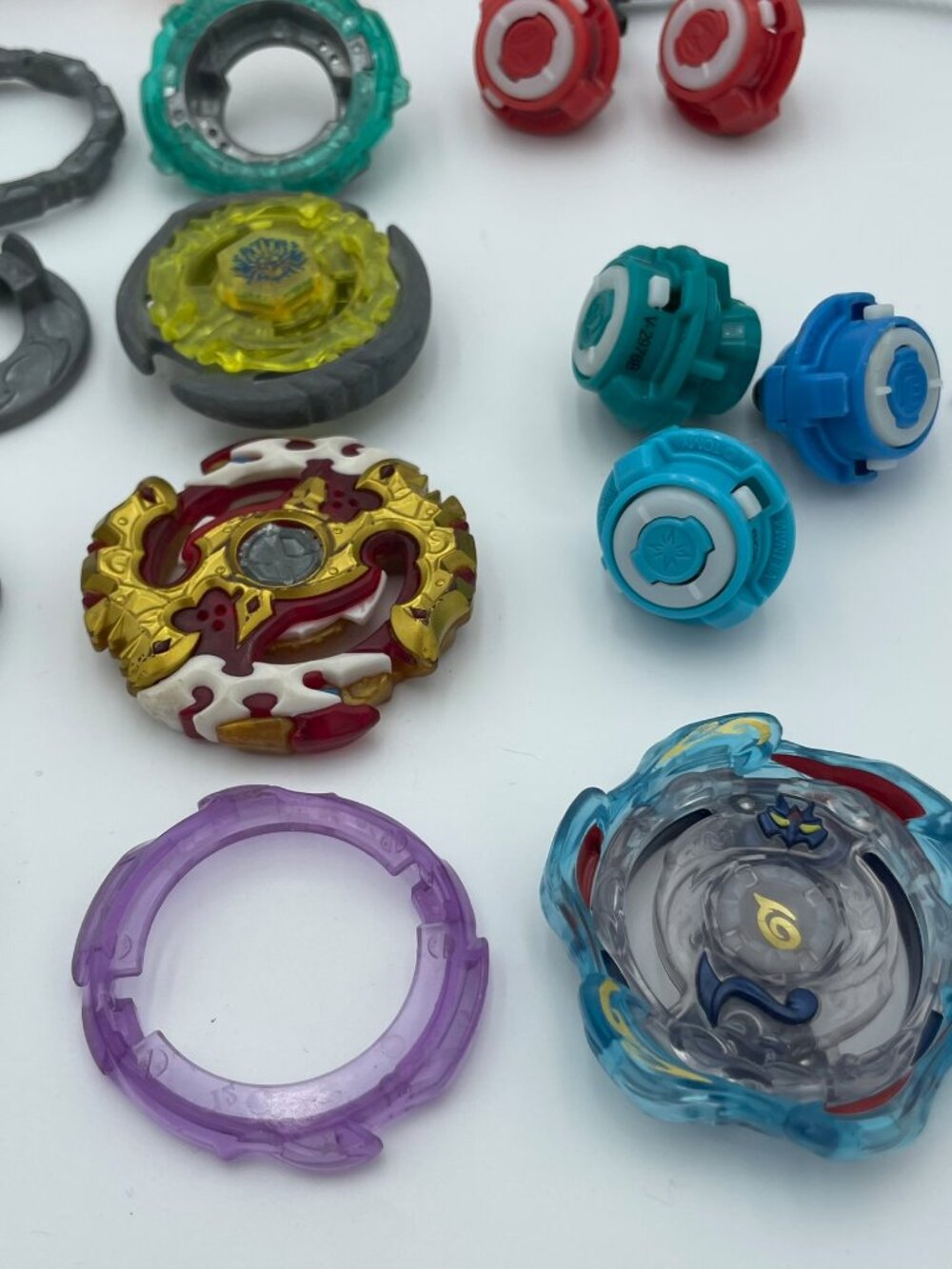 Beyblade Burst Parts Lot – Mixed Layers, Discs, Drivers & Launchers - Picture 4 of 5